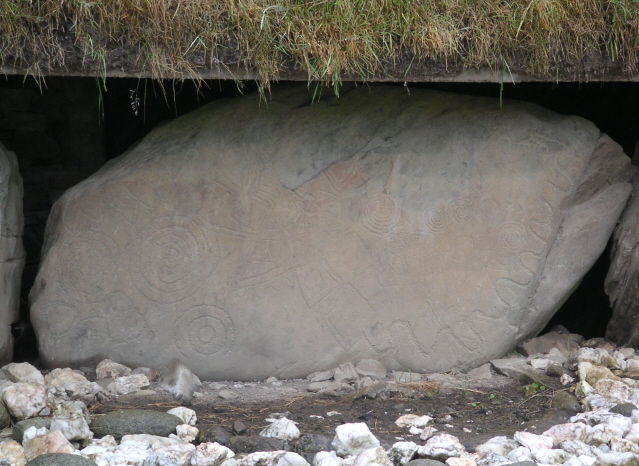 [neolithic carved art on megalith]