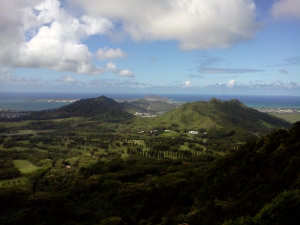 [green hills, fluffy clouds]