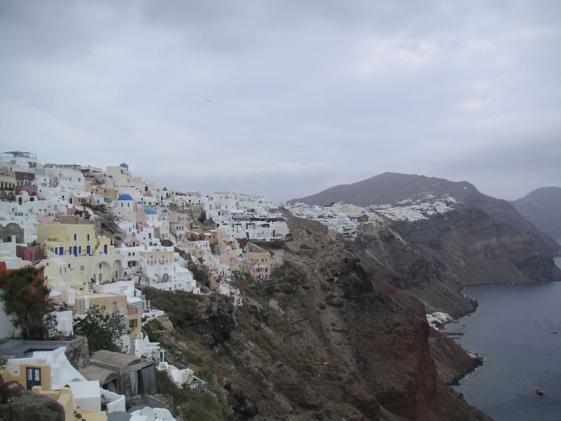 [white buildings in the cliff]